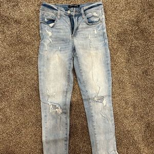 Distressed women’s jeans